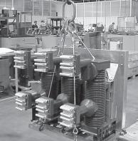 2b) and dismantle the crosspiece (2) by unscrewing the screws (3). 36 kv circuit-breakers Attach the tools (1) to lift and handle the circuit-breaker (fig.