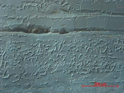 Figur 10. Foto från mikroskopet på etsat prov från holken av ämnesjärnet från Villsberga.