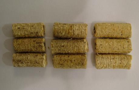 Figur 11 redovisar pellets med 1, 2,5 och 4 % additiv efter