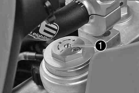 12Ställa in gaffelns kompressionsdämpning Den hydrauliska kompressionsdämpningen avgör hur gaffeln beter sig vid kompression. Vrid justerskruven medsols tills det tar stopp.