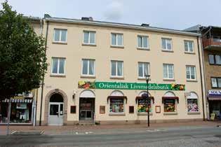 Kulturhistorisk byggnadsinventering nr 54 Melleruds tätort med närområdet mot Vänern 29 Kransen 11. Entréportens omfattning och dekorerade slutsten.