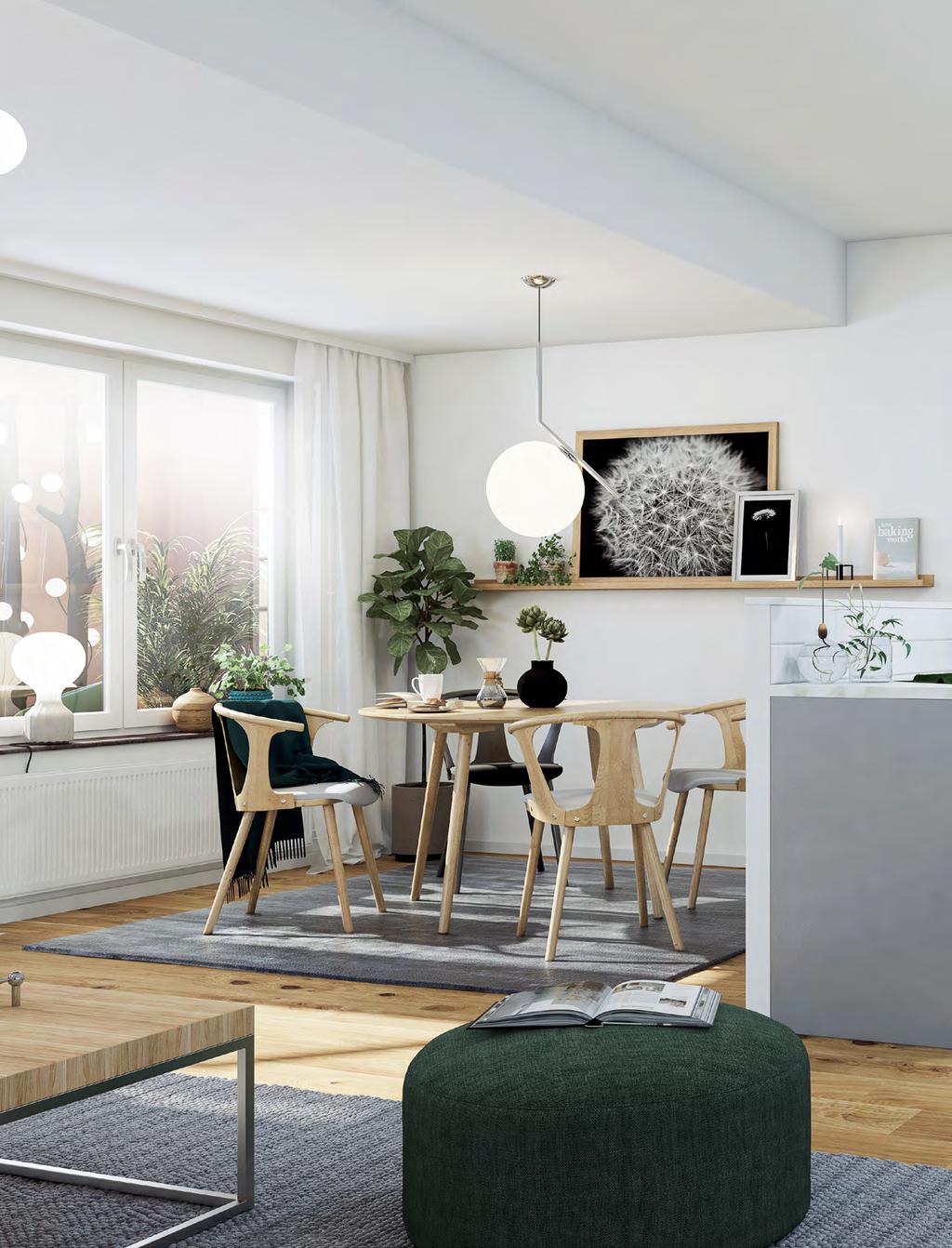Kök med öppna ytor, utrustat med moderna och energisnåla vitvaror. Praktiska arbetsytor och gott om förvaringsutrymmen.