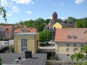 att man på samma plats rivit Torshälla fattigstuga byggs 1838. Kvarnen nederst till höger på bilden, är från 1628, och har haft många ägare och efter branden den 17 maj 1947 ej använts.