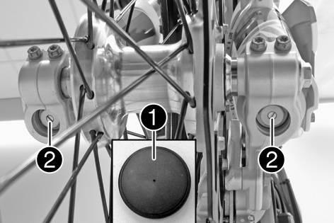 10 INSTÄLLNING AV CHASSIT 37 10.13 Ställa in gaffelns returdämpning Den hydrauliska returdämpningen avgör hur gaffeln beter sig vid utfjädringen.