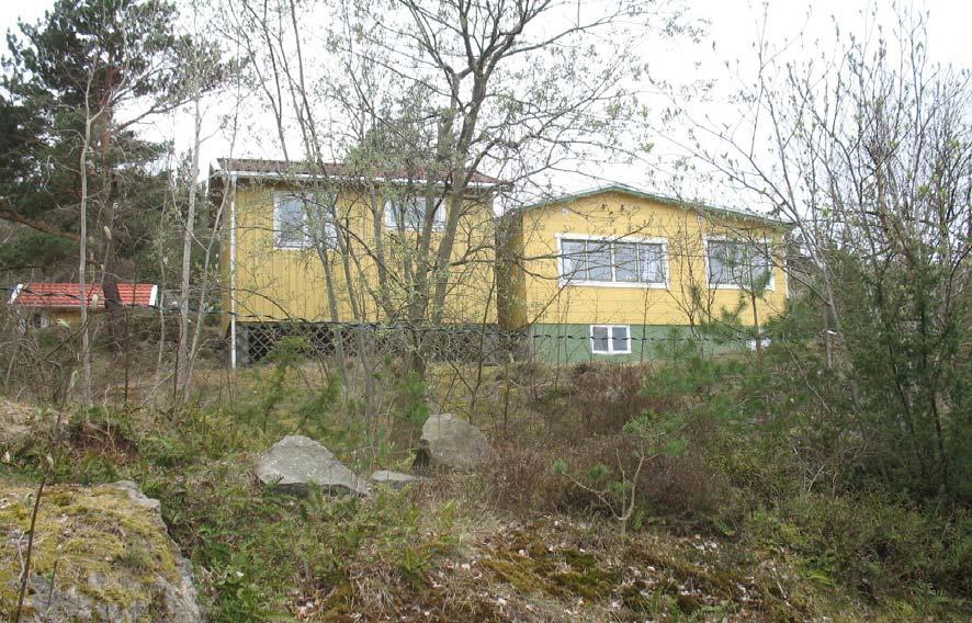 Hus direkt nordväst om planområdet Planområdets omgivande byggnader består av tillbyggda