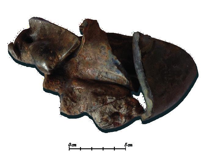 Arkeologgruppen AB rapport 016:39 Kontext 1191 F 69 Liten del av en fot till ett flöjtglas eller ett passglas med en påblåst noppa. Andra halvan av 1600-talet.