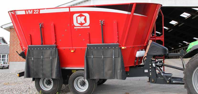 Fodervagnar med 2 vertikalskruvar Utmatningsluckor VM-2, med hydrauliskt justerbart drag (extra utrustning) Smörjbank för axelsystem (VM-2 och VM-3) Genom denna smörjbank smörjs alla smörjpunkter i