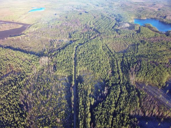 65 Figur 7-19. Flygfoto av näromgivningen vid Outovesi projektområde sett från sydväst (källa: Kaamos Production, Eero Mäenpää).