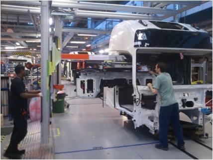 Figure 7: The assembly of huge interior in a truck cab as it is performed today Here, a virtual analysis has been performed in order to identify the challenges to use a robot as a carrier on a