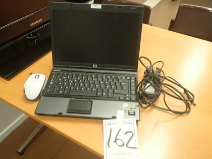 1 HP laptop compaq 6910