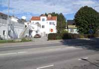 Det gröna huset vid korsningen. Jämför bild s.