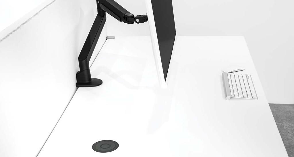 BOOM QI LOADER Boom Qi Loader är en trådlös laddare för mobil och surfplatta. Boom Qi Loader kan sänkas ner i skrivbord, konferensbord, köksö eller nattygsbord.