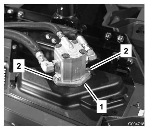 Figur 64 1. Rem 4. Remstyrning 2. Öglebult 5. Flänsmutter 3. Förlängningsfjäder 6. Stoppbult Figur 65 1. Hydraulmotor 2.