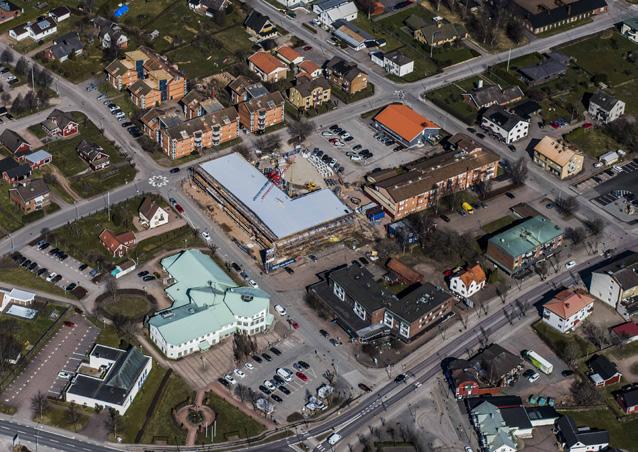 SÖDRA LÅNGGATAN MALMGATAN TORGGATAN NORRA NISSASTIGEN Flygoto över området SAMMANFATTNING Området är beläget i centrala Smålandsstenar och gränsar till Södra Långgatan i väster och Malmgatan i norr.