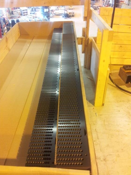 3. Stackning Stackningen är första steget i tillverkning av en vågkraftgenerator. Det innebär att sätta ihop de tunna statorplåtarna till ett stort block som sedan lindas. 3.