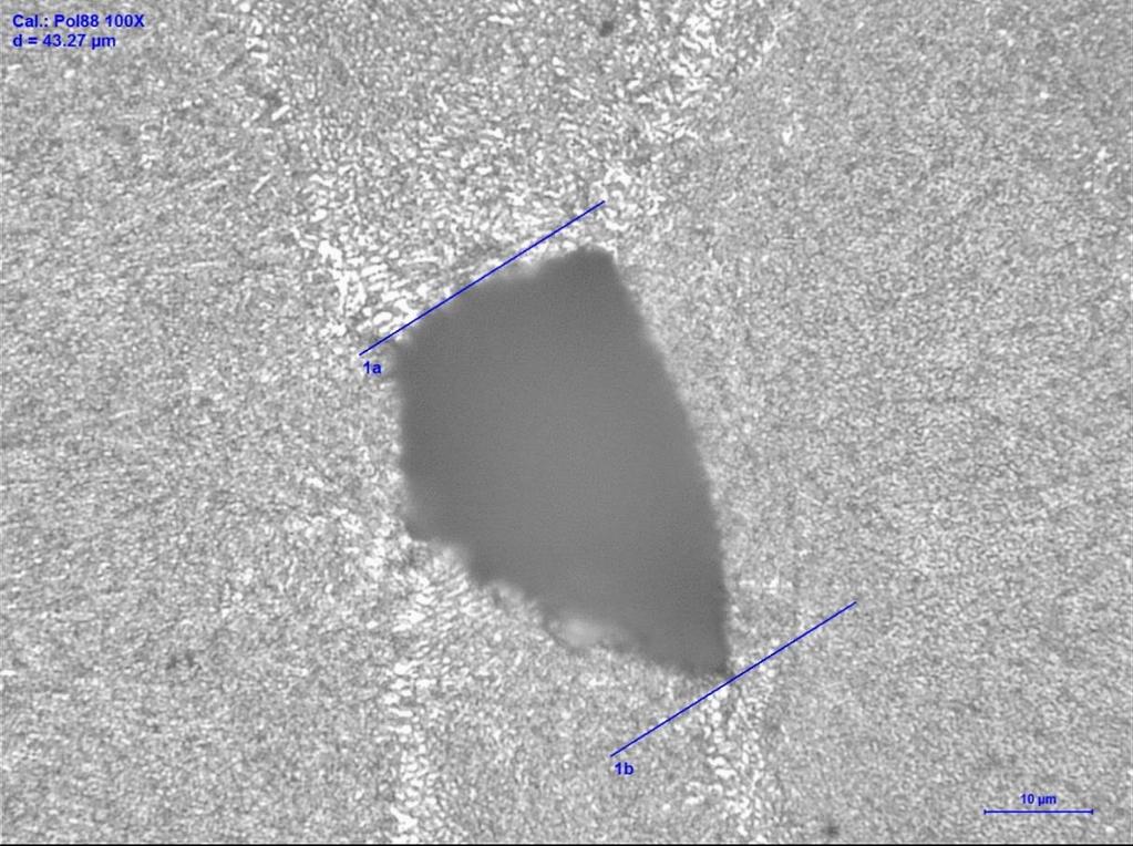 ~29 µm sfärisk por. Figur 28.