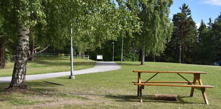 I bakgrunden skymtar placeringen för den tilltänkta parkeringsplatsen.