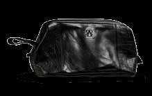 YKK-metalldragkedja. Packad i tygpåse. 37x29x7 cm.