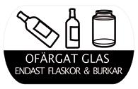 Burkar och flaskor i ofärgat glas, det vill säga genomskinligt glas, slänger du här. Färgat glas sorteras i eget fack. Förpackningarna ska vara tomma och du lägger dem löst i kärlet.