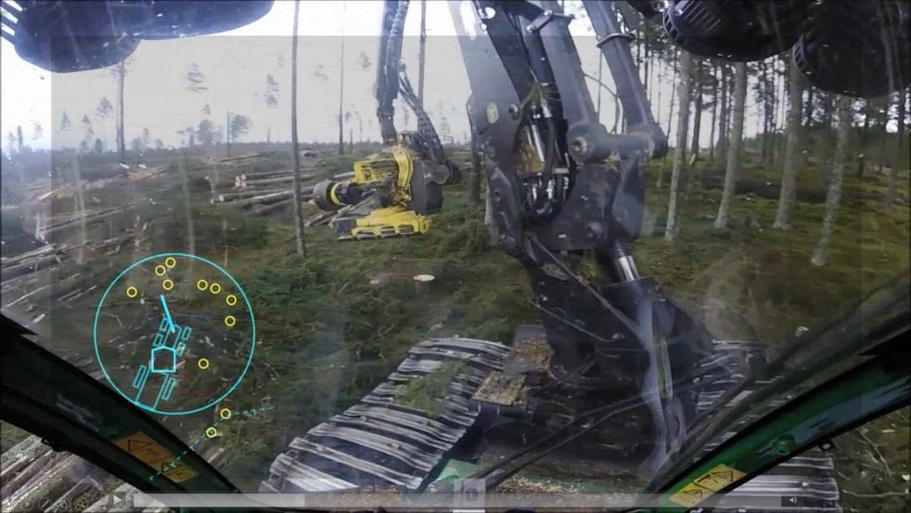 Figur 11. Beslutsstöd i skördarens head-up display med trädpositioner till vänster som kan peka på vilka stammar som ska avverkas. Foto: Staffan Till & Anders Nordlie. SLUTSATSER 1.
