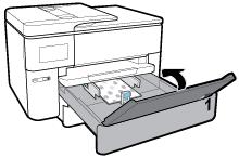 5. Justera pappersledarna för bredd och pappersledaren för längd tills de når kanten av pappersbunten. 6. Kontrollera området i inmatningsfacket inuti skrivaren.