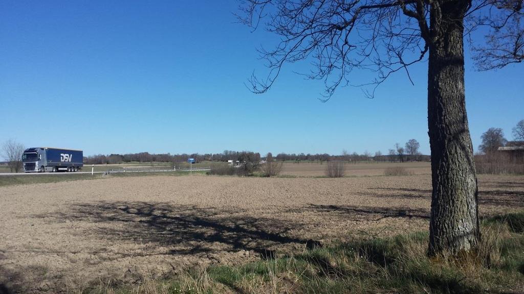 Öppet odlingslandskap kring E20 vid Ingarud 3.Tjos-Fåleberg och Hassle kyrkby Tjos Fåleberg är ett område som utpekats som kulturmiljö av kommunalt intresse.