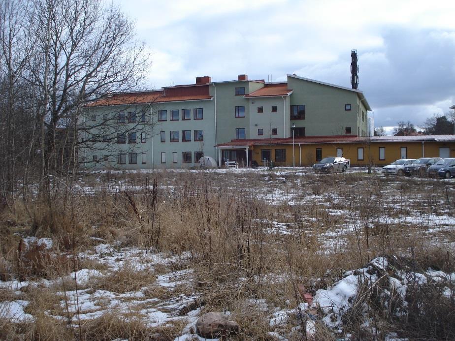 PM Figur 10. Foto på byggnad på fastighet Sköndal 1:14. Fotot är taget vid platsbesök 2016-02-22.