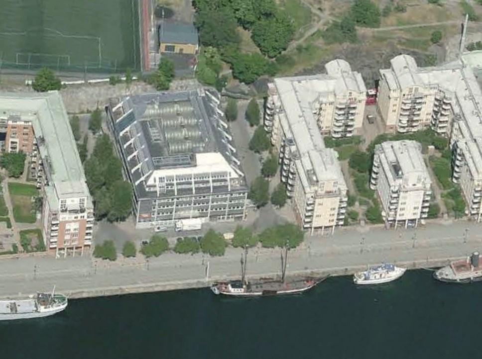 Sida 6 (12) Flygfotografi taget norrut, visandes, Hammarbykanalen med Norra Hammarbykajen, Kv. Hönsfodret 1, stiltypiska kringliggande områdeskvarter och del av Stora Blecktornsparken.