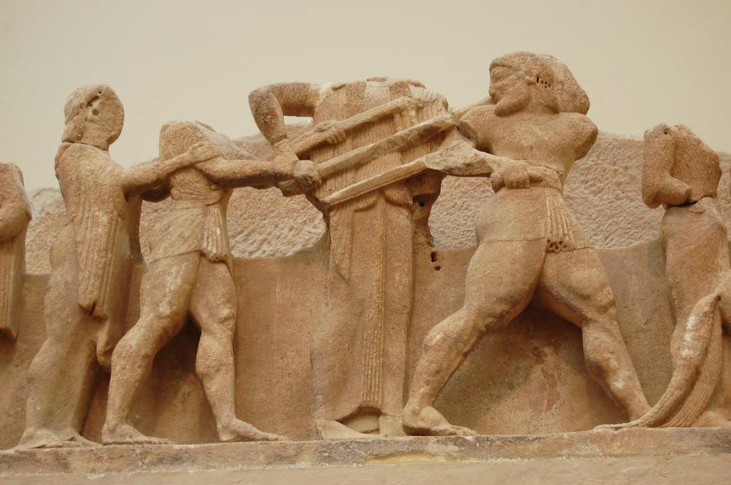 Det föreställer Herakles och Apollons kamp om den delfiska trefoten, som Apollons