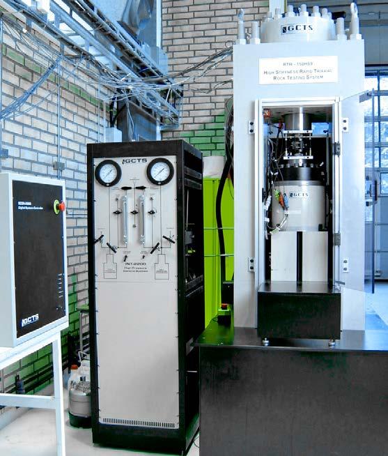 Figure 4 4. Rock testing system. From left: Digital controller unit, pressure cabinet (used for triaxial tests) and load frame.