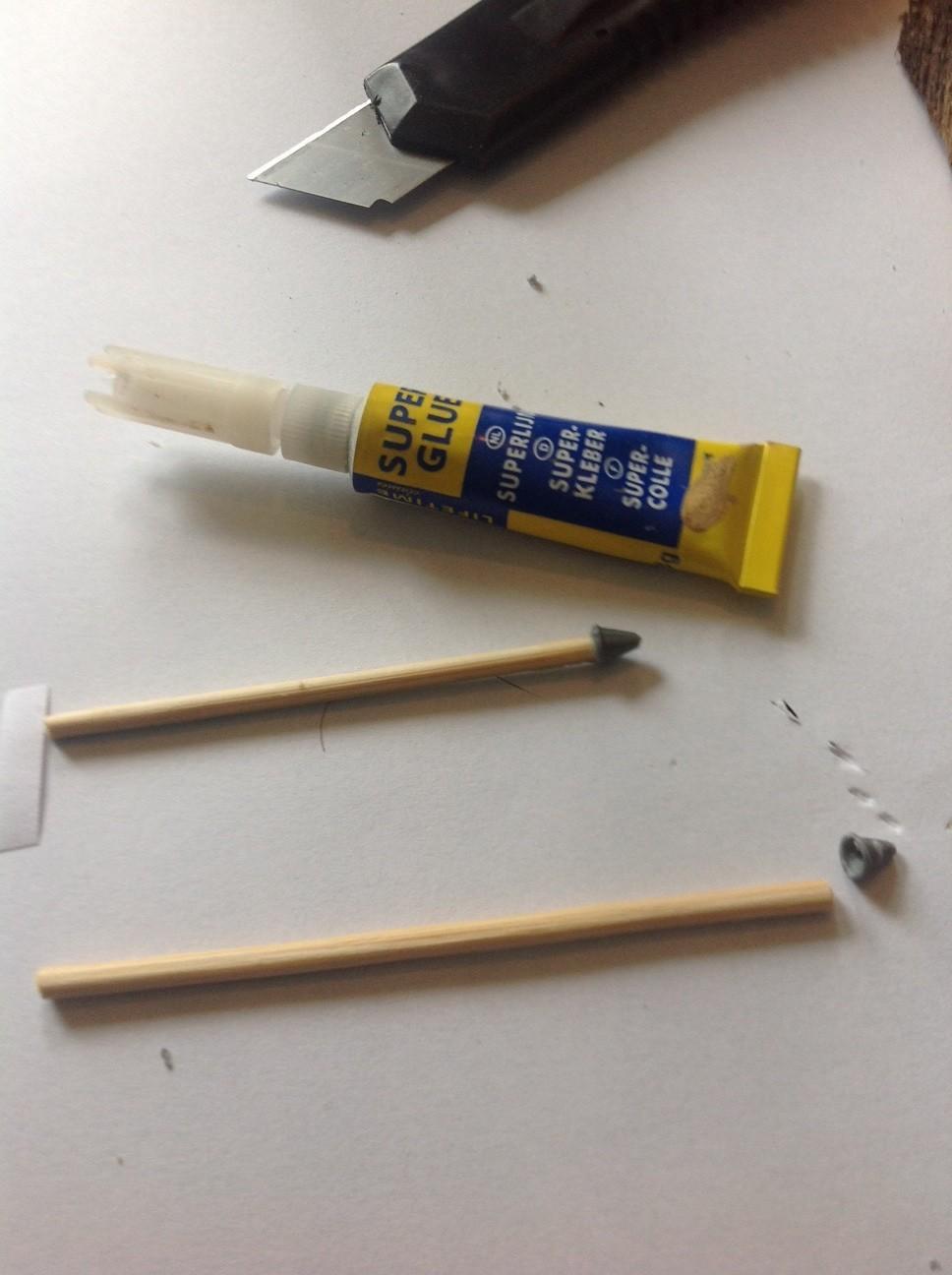 Steg 4: När granaten verkligen är fastlimad på pinnen kan du börja slippa