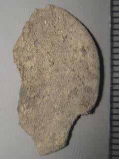 Fnr 1082 Mynt / beslag?(fragment). Silver /kopparlegering?