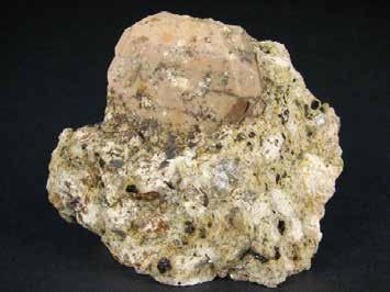 Våra vanligaste bergartsbildande mineral Kalifältspat - KAlSi 3
