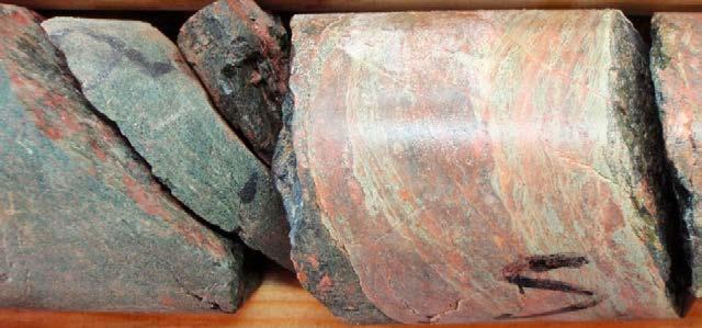 RU1c (272.87 370.73 m) Äspö diorite (501037). Scattered, decimetre-wide zones of brittle-ductile deformation in the interval 347 370.7 m; the brittle component sealed by epidote. Confidence level = 3.