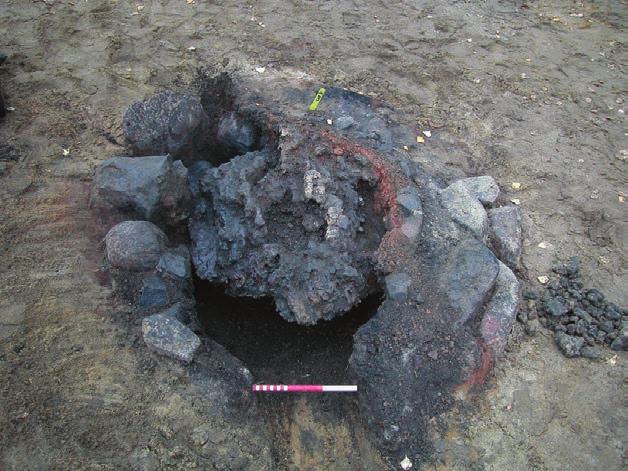 Figure 6a-c: Two examples of large bloomery furnaces with slag pits built by stones. In both, large slag blocks were left. The furnace in A, from Åsbyggeby, has a horseshoe shape.