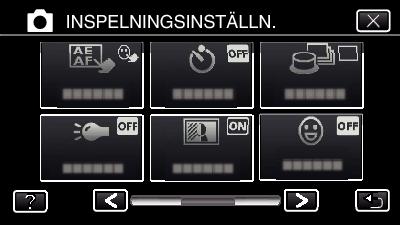 Inspelning 4 Tryck på SJÄLVUTLÖSARE. Spela in videor med datum och tid Man kan spela in videor med tid och datum. Välj detta alternativ när du vill spara filen med datum- och tidsangivelse.