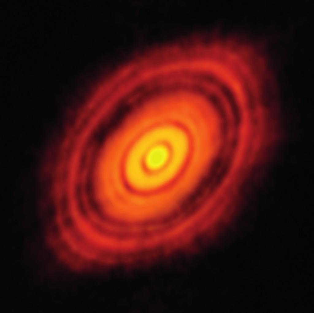 ANDERS JOHANSEN Figur 1: Den protoplanetära skivan kring den unga stjärnan HL Tau. Bilden visar strålning med en våglängd på 1 millimeter, uppfångad av ALMA-teleskopen i Chile 2014.