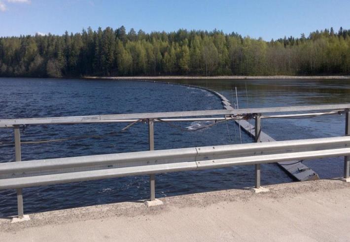 Sikfors kraftverk, fiskvandring. Utveckling av lax- och havsöringbestånden. Dammutskov och fisktrappans mynning vid dammen i Sikfors.
