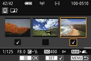 Du kan välja bilder från en trebildsvisning genom att trycka på knappen <I>.