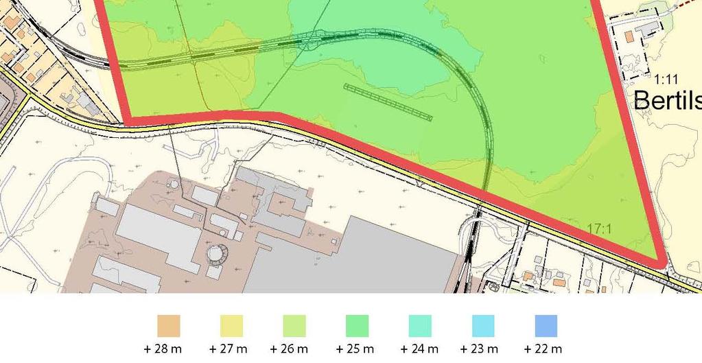 Övriga delar utgörs av en befintlig parkeringsplats, en grusväg, trädplantering och gräsbevuxen