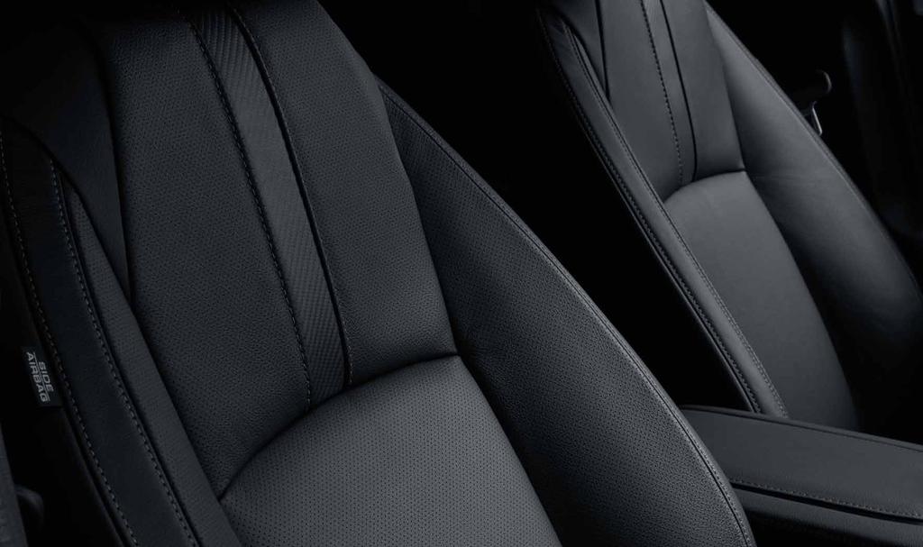 den. SVART LÄDER BEIGET LÄDER SVART TYG EXECUTIVE ELEGANCE