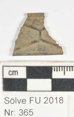 Fragment Material: Cu-legering Antal: 1 Mått: Vikt in: 0,88g Vikt ut: 0,87g Foto: Ja Behandling: