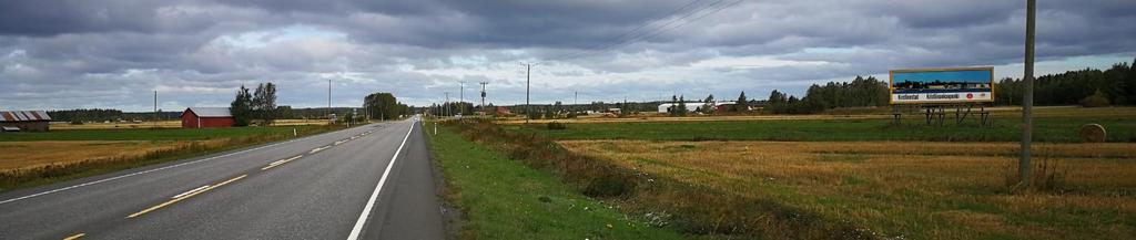 1-31 FOTOPUNKT 4 RIKSVÄG 8 Ger en bild av inverkan på miljön över de öppna åkerområdena från Riksväg 8, Lappfjärd. Bild 23.