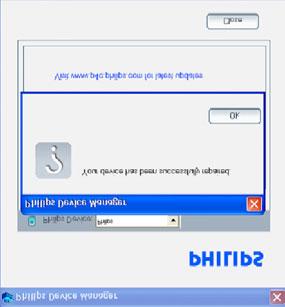 7. Al completamento del processo di riparazione, fare clic su OK e scollegare il lettore. 8. Sarà visualizzato il messaggio Updating Firmware (Aggiornamento firmware). 9.