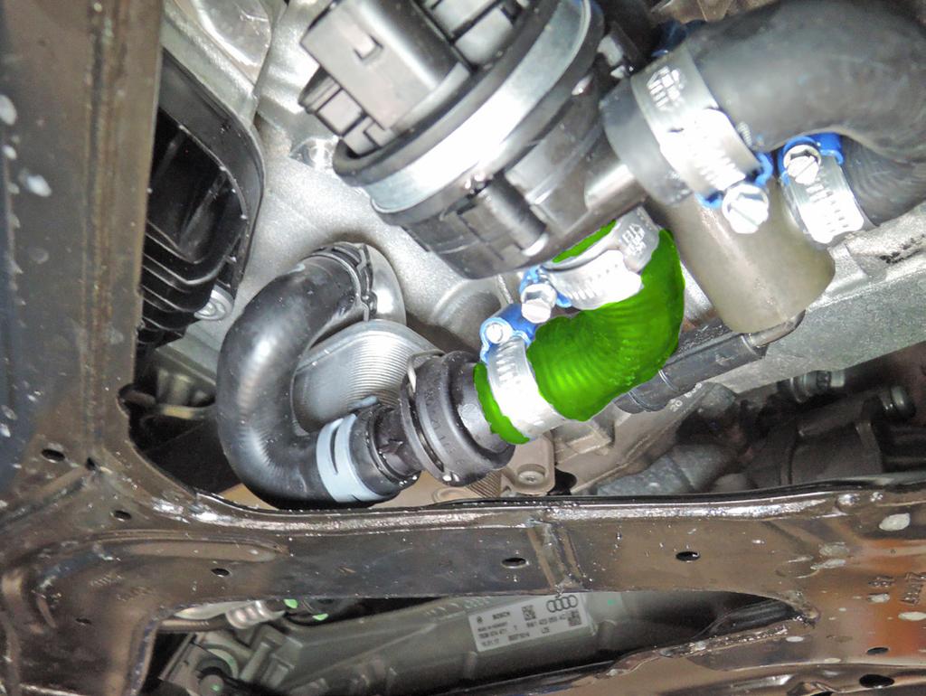 Fit hose () to coolant pipe connection with supplied hose clamp.. Fit hose () to ceck valve connection with supplied hose clamp. 6.