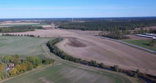 figur 4.4.4:1. Ytor med berg i dagen förekommer i liten utsträckning. Berget är till stor del täckt av vegetation, som mossor eller annan undervegetation.