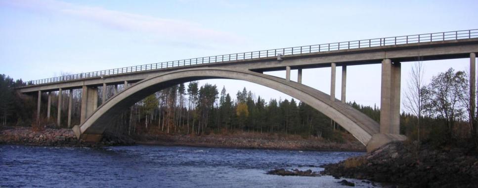 1870 2 6900 6040 5000 5000 10000 7e 6e 3600 Figure 1. The Railway Concrete Arch Bridge over Kalix River at Långforsen. 2. GEOMETRY AND MATERIAL PROPERTIES The bridge was built with concrete Btg K 400 with nominal characteristic compressive and tensile strengths of f cck = 30.