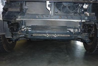 7. Remove grill an fog light assemblies from