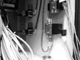 Tryckluftsackumulator Tryckluftsackumulatorn minimerer tryckfall i atomiseringsluften, som kan uppstå vid den automatiska filterrengöringen.
