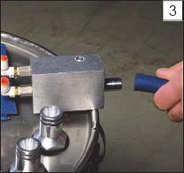 bild 5 12 2. Tag av pulverslangen (bild 5 12). 3. Drag ut pumpen.